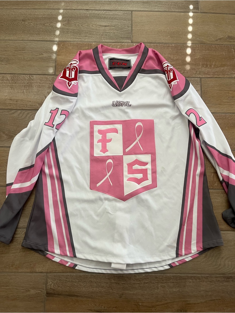 Dubuque fighting Saints USHL Breast Cancer awareness, jersey